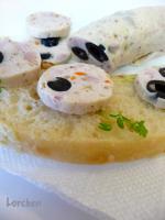 Salsiccia di pollo con olive     