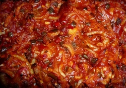 Рецепт: Свинина в томате с луком