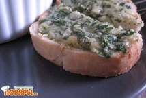 Шаг 2: Приготовление чесночно-сырных гренок: Сливочное масло …